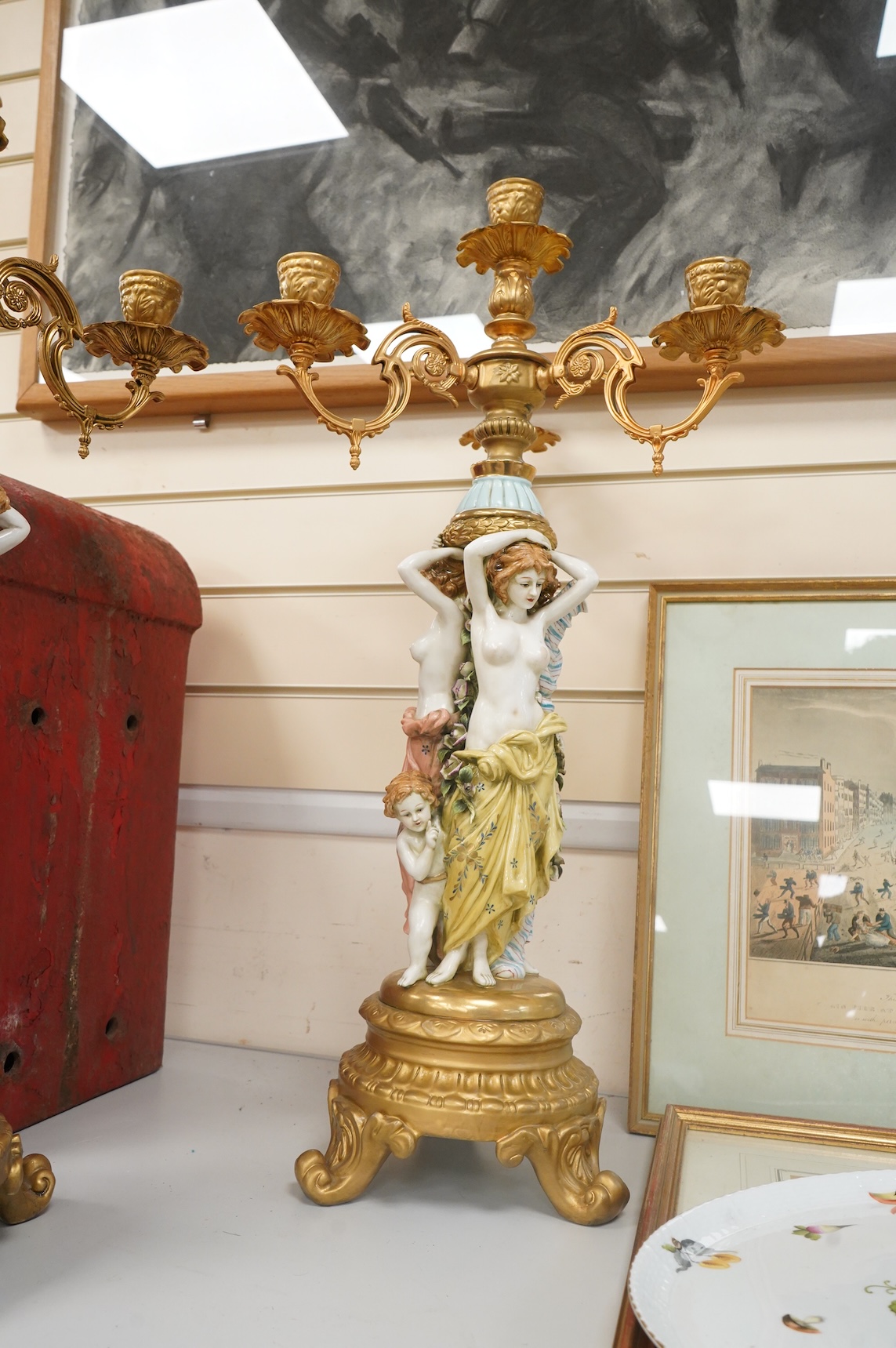 A pair of mid 20th century Italian porcelain and gilt metal mounted figural candelabra- 69cm high